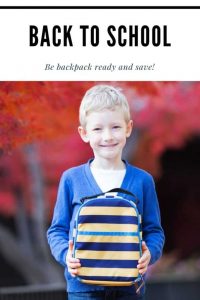 Boy holding a backpack